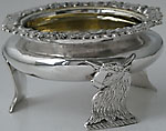 George IV circular salt cellar with cast border and heraldic legs London 1825 James Aldous